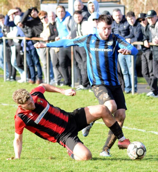 Shane Walsh skips past Jake Smith. Picture Gordon Thomas